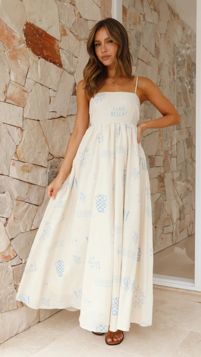 Vestido largo azul con detalles recortados y efecto bronceado | Bella Brisa