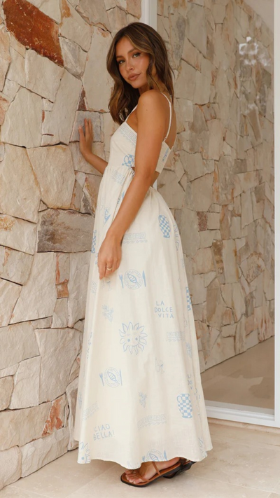 Vestido largo azul con detalles recortados y efecto bronceado | Bella Brisa