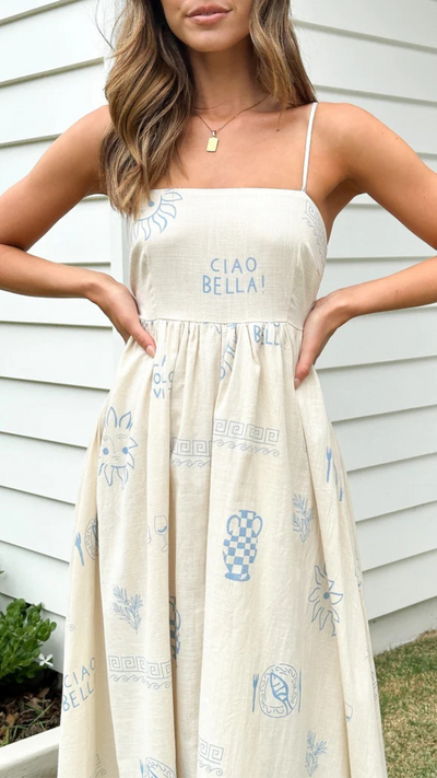 Vestido largo azul con detalles recortados y efecto bronceado | Bella Brisa