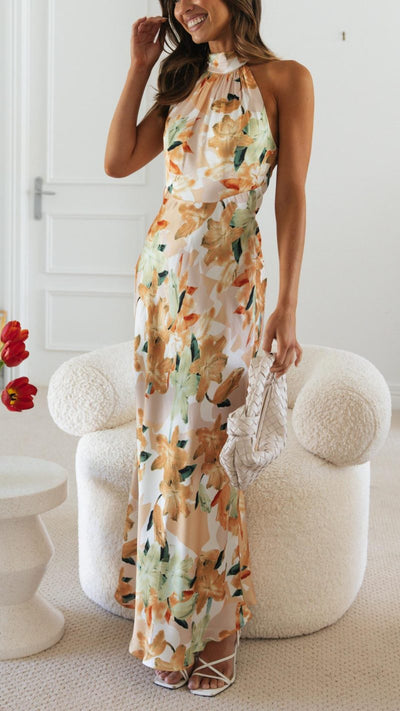 Vestido floral largo con espalda abierta y cuello halter | Bella Brisa