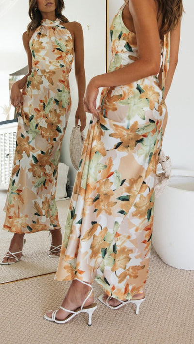 Vestido floral largo con espalda abierta y cuello halter | Bella Brisa