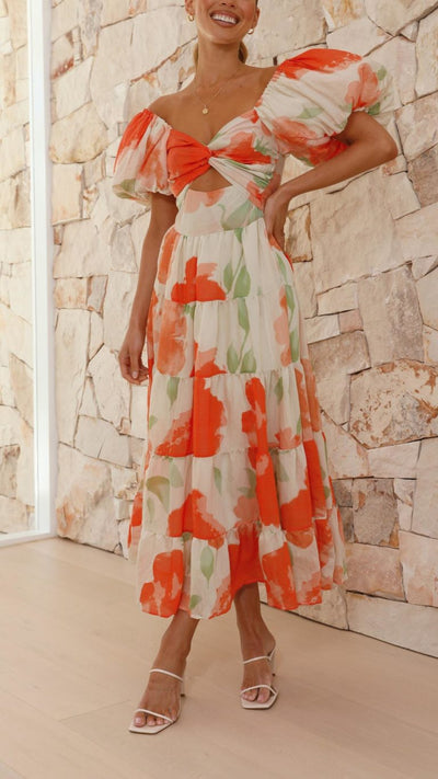 Vestido largo floral naranja con mangas abullonadas | Bella Brisa