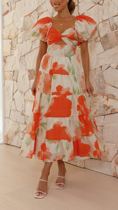 Vestido largo floral naranja con mangas abullonadas | Bella Brisa