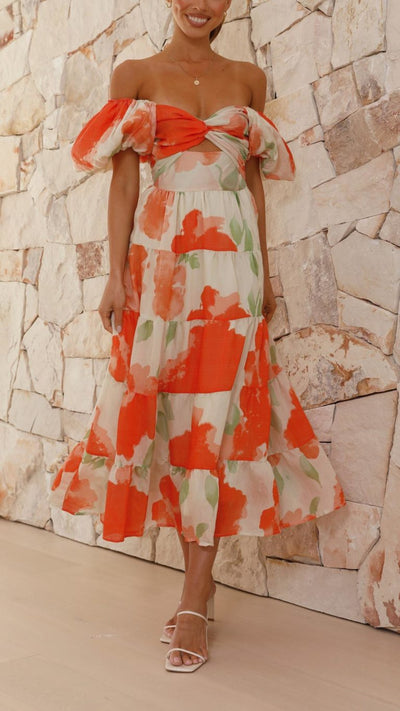 Vestido largo floral naranja con mangas abullonadas | Bella Brisa