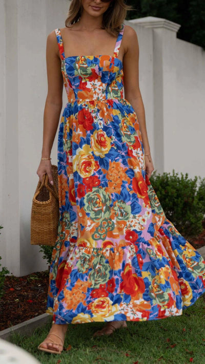 Vestido largo con escote cuadrado y estampado floral vibrante | Bella Brisa